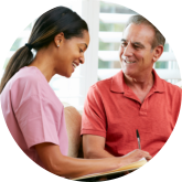 nurse assisting client