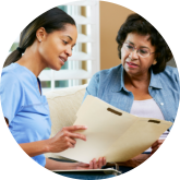 nurse assisting client